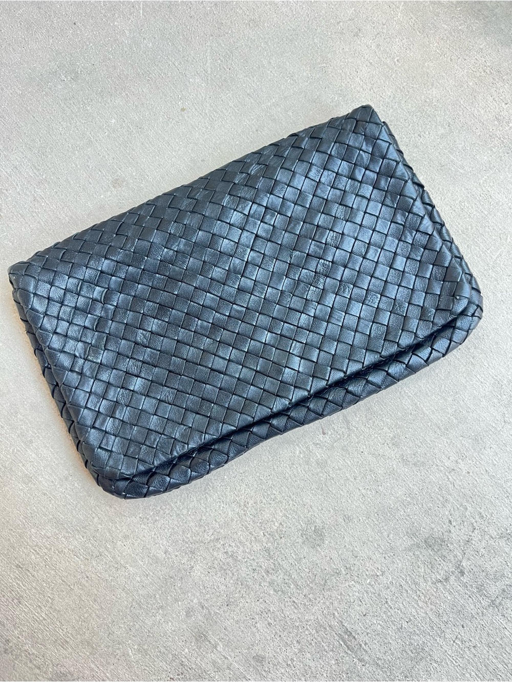 Christopher Kon black leather woven clutch